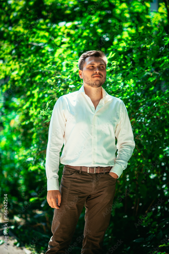Handsome young man on nature background Handsome young man on nature background