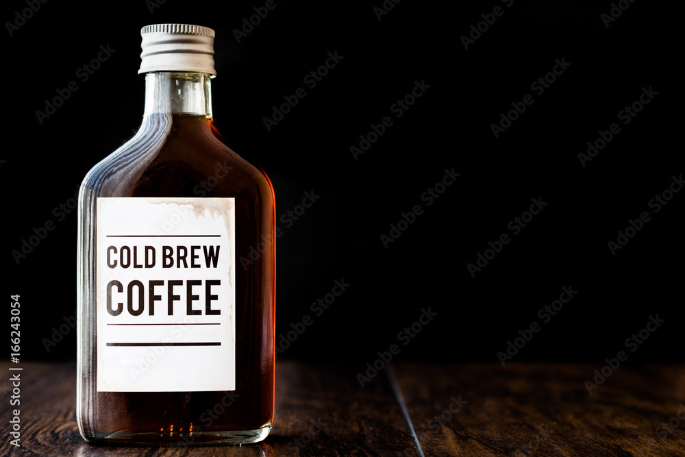 Cold brew coffee in a bottle. - obrazy, fototapety, plakaty 
