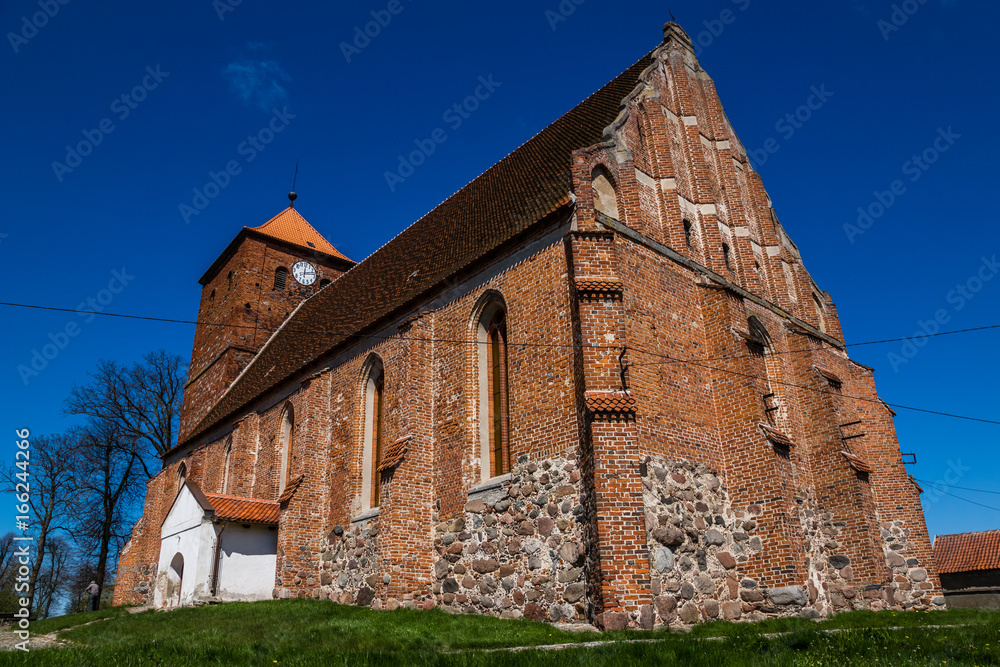 Gothic church in Barciany village, Masuria, Poland