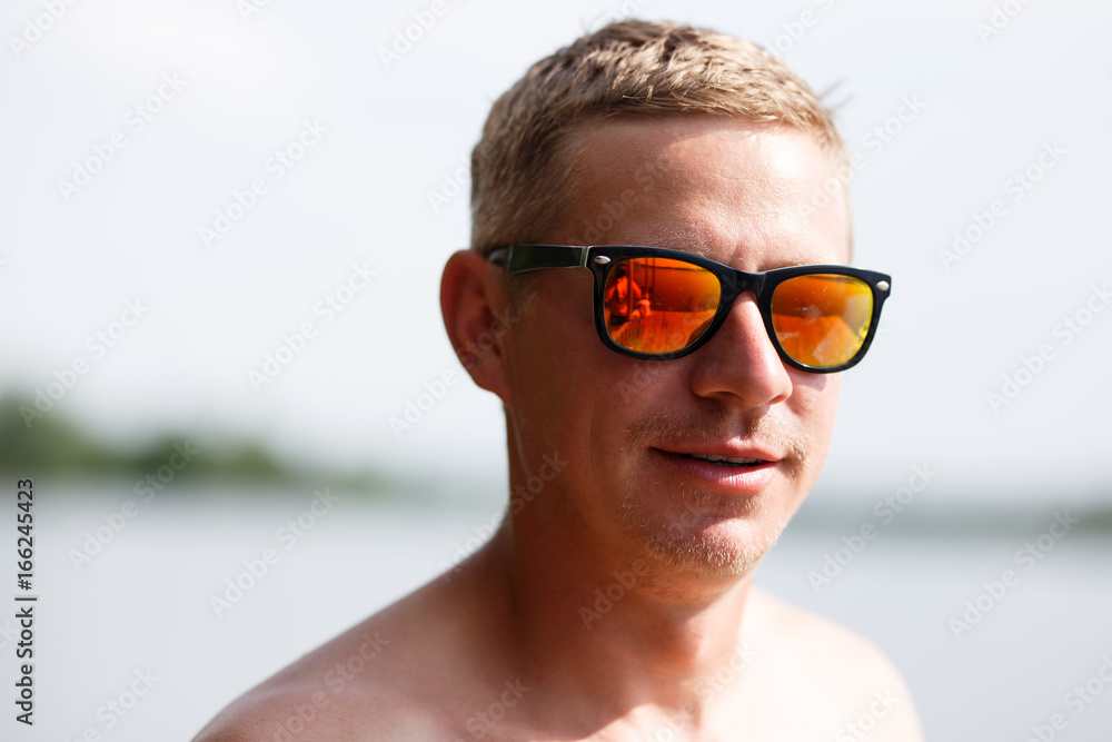 Outdoor portrait of a handsome young man. Outdoor portrait of a handsome young man.