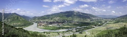 Mtskheta near Tbilisi in Georgia - Caucasus. Panorama view on river and unesco town Mtskheta from Jvari church near Tbilisi in Georgia.