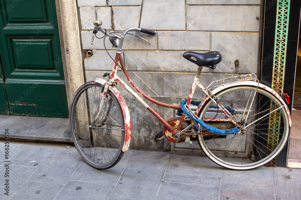 Bicycle on the street in Pisa, Italy