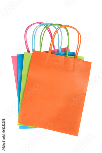 Colourful paper shopping bags isolated on white