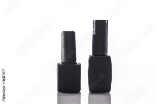 Nail art concept.  top and base bottle isolated on white