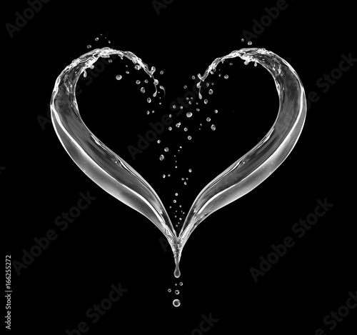 Splashes of water in the shape of the heart on black background