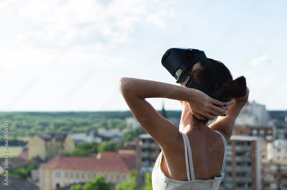 back view of woman back, girl holding mobile phone back view of woman back, girl holding mobile phone