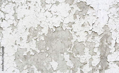 Old cracked painted plaster wall photo