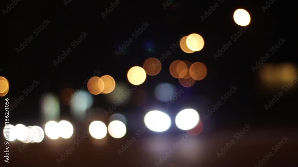 Night Car Street Light. Cars in the City at Night by the Street Lighting and Car Headlights. Night Car Street Light. Cars in the City at Night by the Street Lighting and Car Headlights.