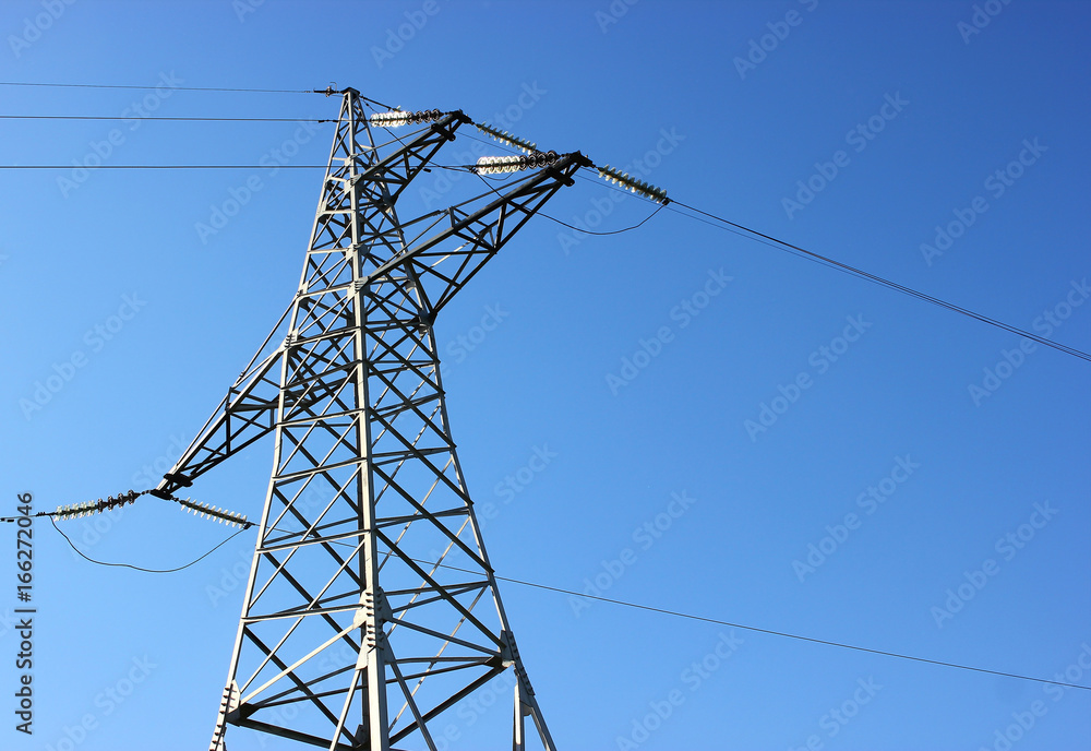 Transmission power tower electricity pylon . Steel lattice tower used to support an overhead power line