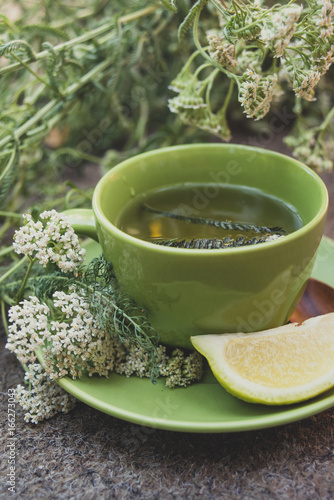 Yarrow tea in a green cup