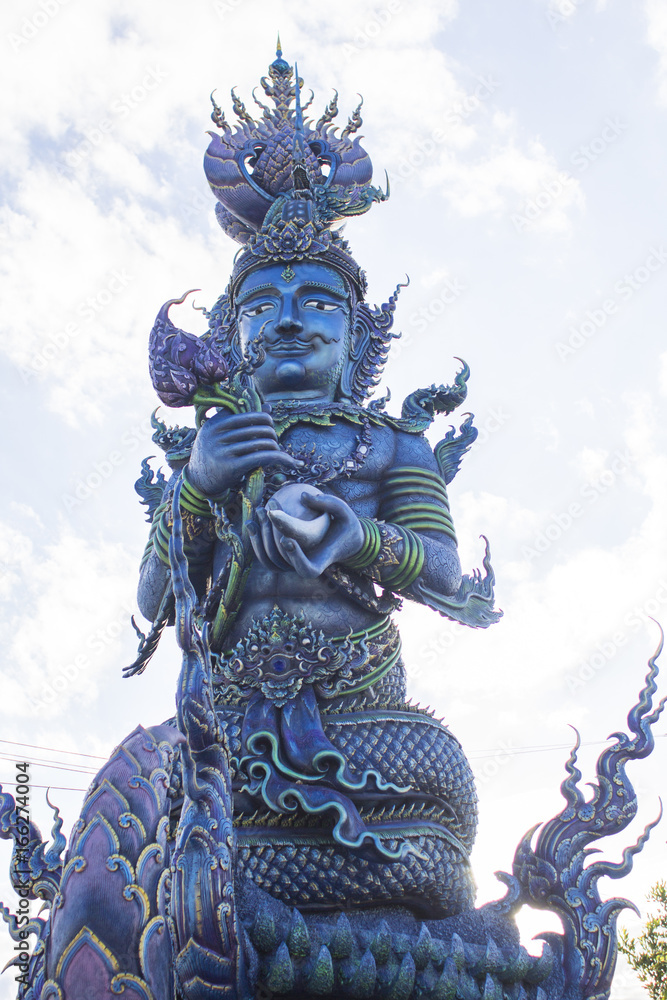 Sculpture Rong Suea Ten Temple (Wat Rong Sua Ten) the famous temple which is decorated in blue tone color. Chiang Rai, Thailand: Jun 20,2017