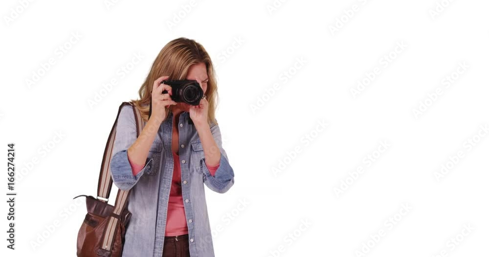 Female tourist taking photo of person on white background with copyspace Female tourist taking photo of person on white background with copyspace