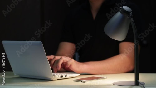 Man Uses Laptop And Come In Of The Shot