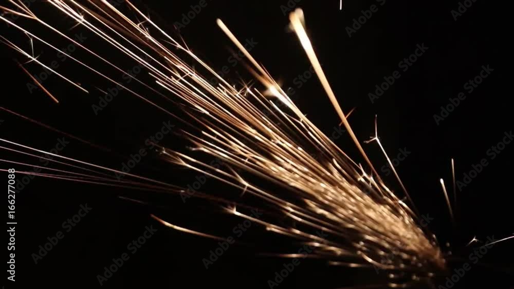 Sparks fly out of the darkness. Screensaver or element for special effects. Black color instead of green background. Sparks fly out of the darkness. Screensaver or element for special effects. Black color instead of green background.
