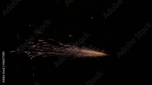 Sparks fly out of the darkness. Screensaver or element for special effects. Black color instead of green background.