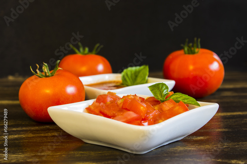  Tomato sauce on wooden background