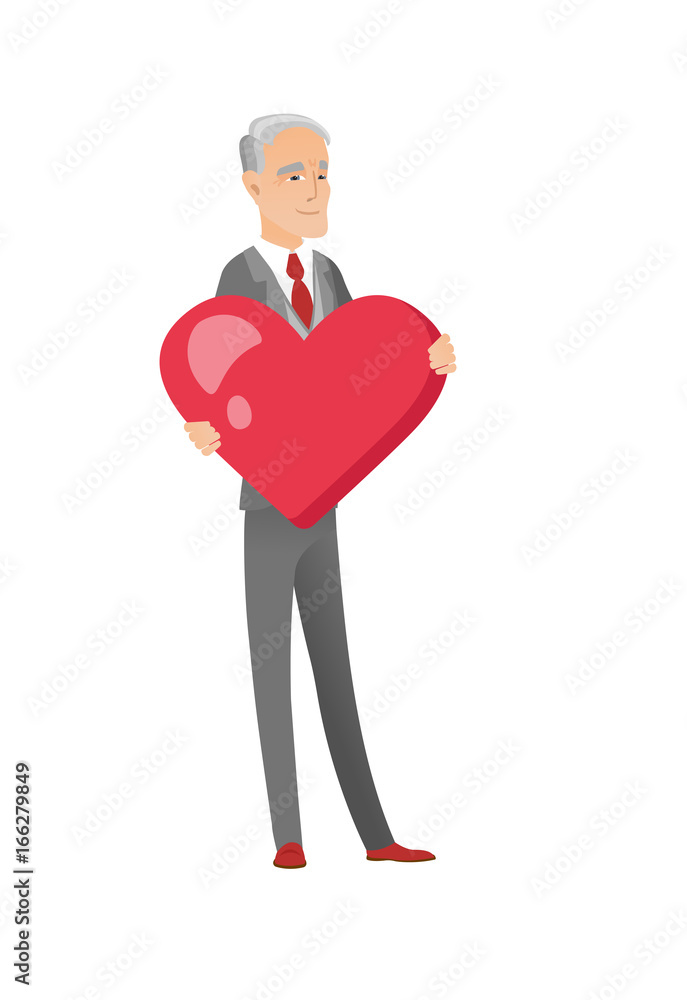 Caucasian businessman holding a big red heart Caucasian businessman holding a big red heart