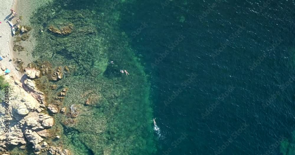 Video from above, aerial view of an amazing beach and turquoise sea in Sardinia, Italy Video from above, aerial view of an amazing beach and turquoise sea in Sardinia, Italy