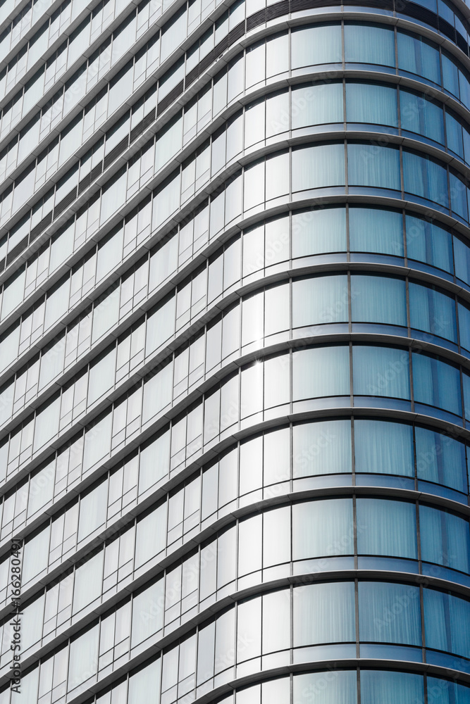 exterior of glass building,blue toned. exterior of glass building,blue toned.