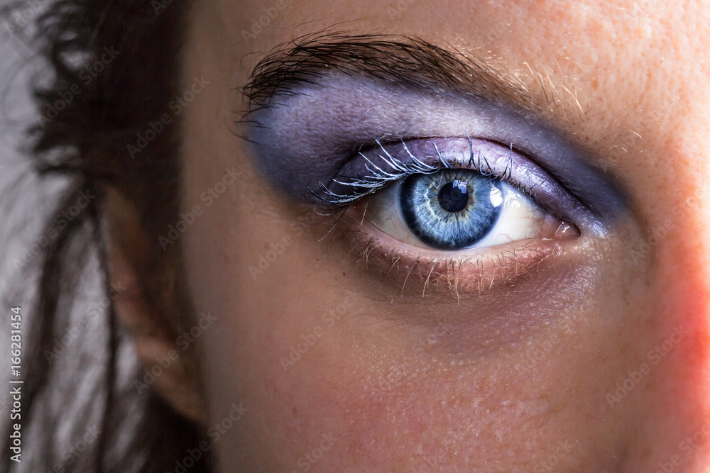 Fototapeta premium Showy blue make up on female eye