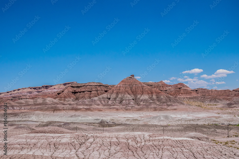 Desert lifeless landscape of Arizona and the blue sky Desert lifeless landscape of Arizona and the blue sky