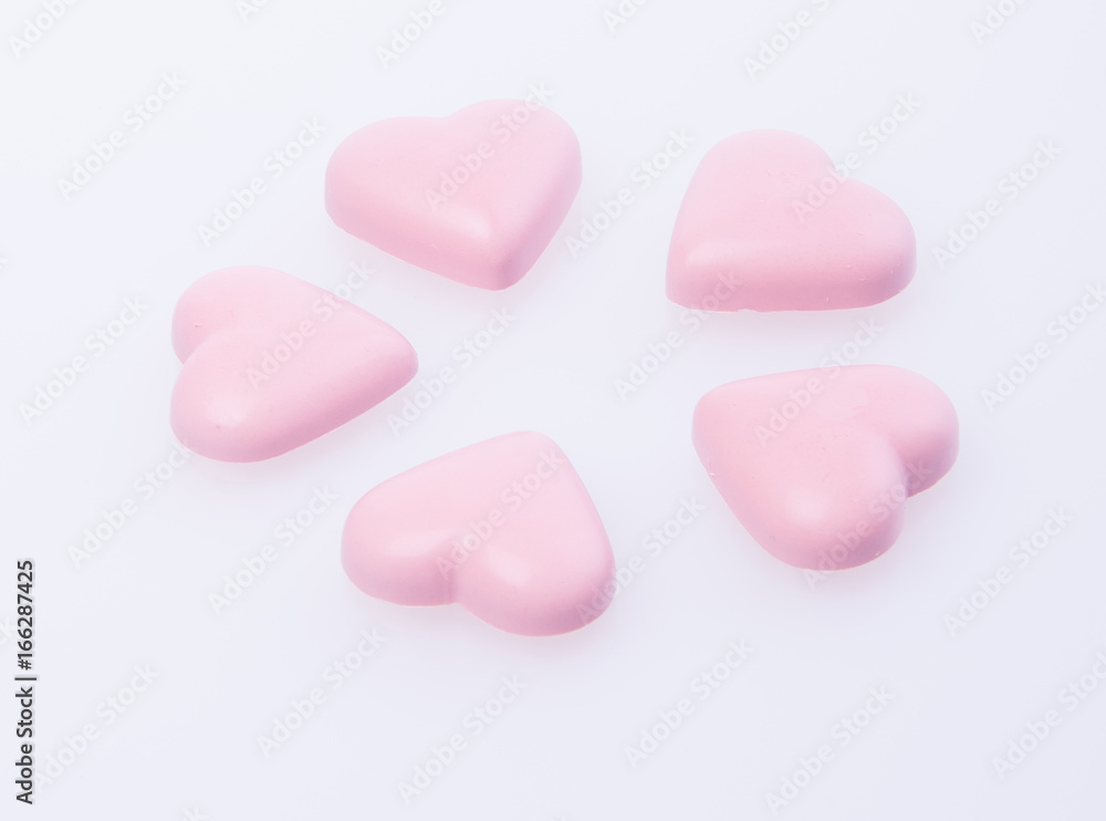 chocolate in pink colour or love shape chocolate. chocolate in pink colour or love shape chocolate.