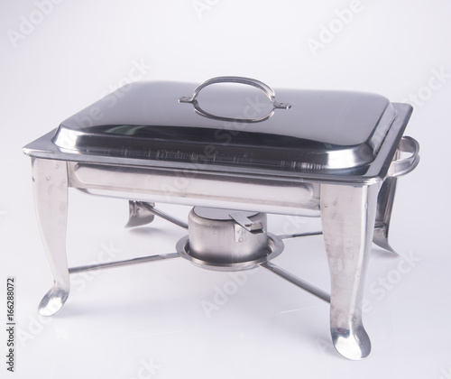 food containers or stainless steel food warmer on background.