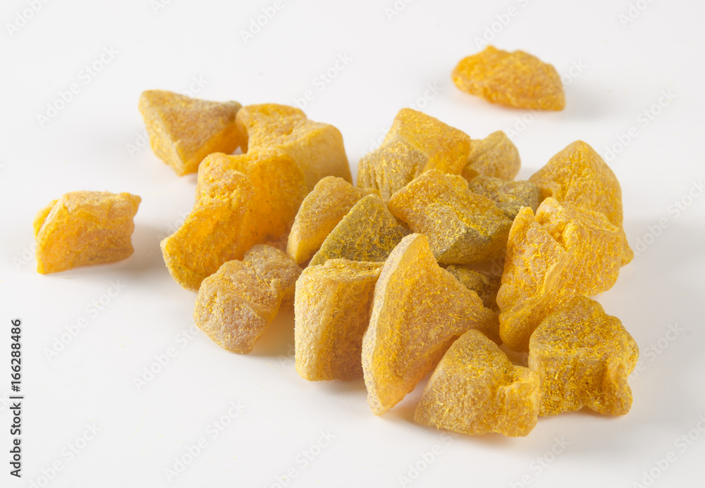 preserved fruits or dry ginger on the background. preserved fruits or dry ginger on the background.
