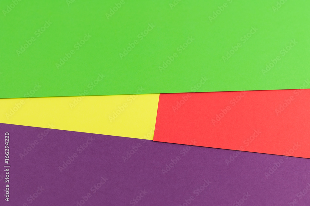 Colourful paper background red yellow green and violet colors