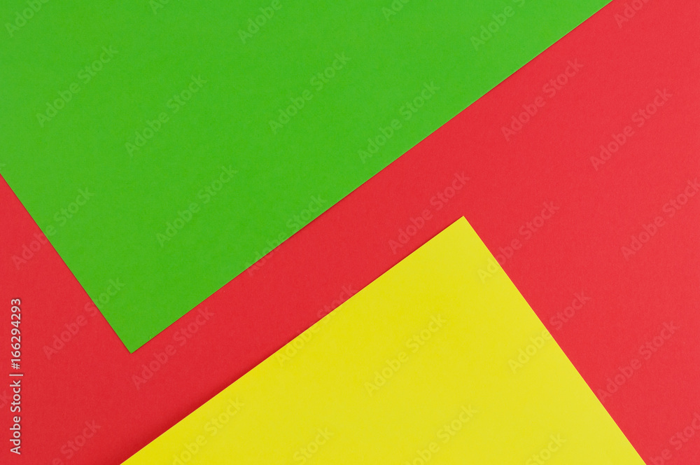 Colourful paper background red green and yellow colors Colourful paper background red green and yellow colors