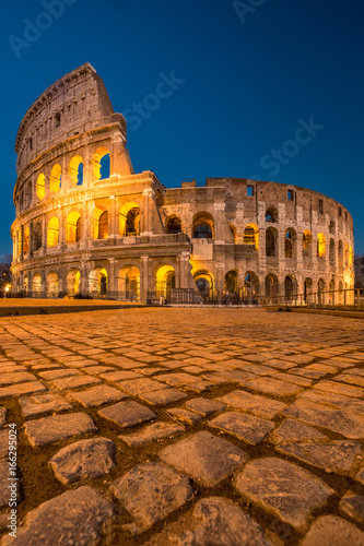 Colosseum at sunset, Rome. Rome best known architecture and landmark. Rome Colosseum is one of the main attractions of Rome and Italy