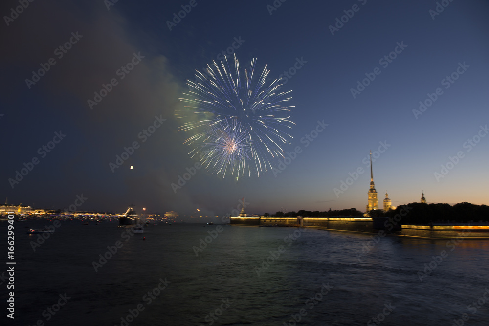Fireworks over Neva river, Peter and Paul Fortress in the light of the salute