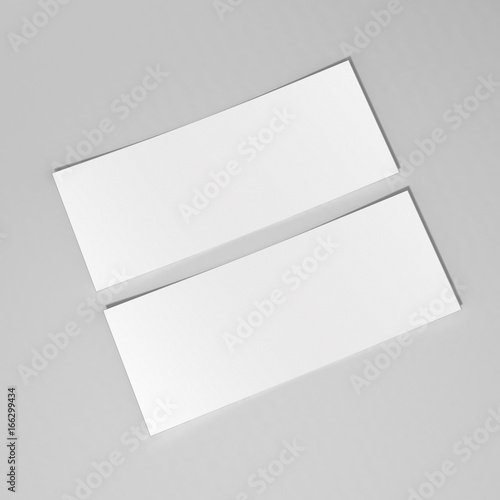 Mock up blank white template gift voucher card on the grey background. For graphic design or presentation, 3D rendering illustration.