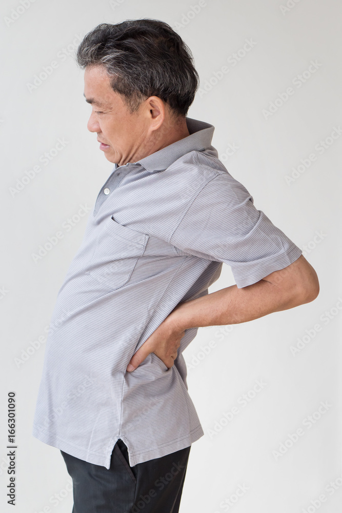 man suffering from back pain, hand holding back man suffering from back pain, hand holding back