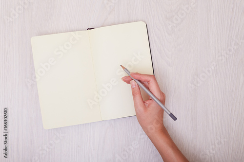 Creative mock up layout made with copy space on table homemade flat lay. Open sketchbook. Hand