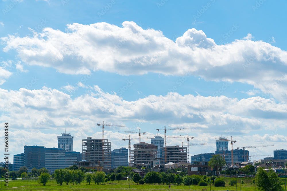 Global construction of a new district in the city. Erection of buildings