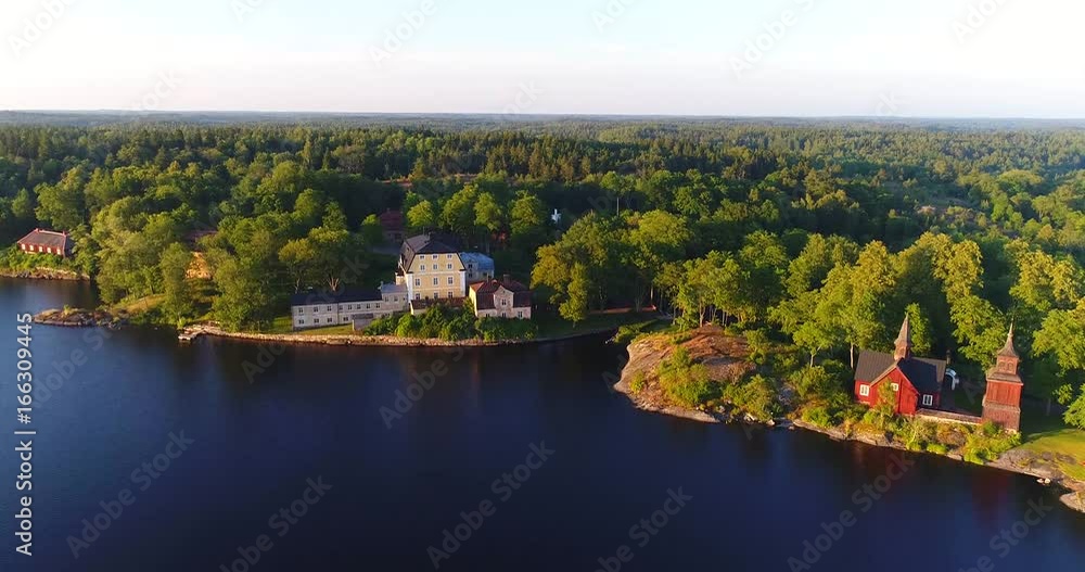 Fagervik, Cinema 4k aerial view over yellow mansion and fagervik steelworks, at a sunny evening, in Inkoo, Uusimaa, Finland Fagervik, Cinema 4k aerial view over yellow mansion and fagervik steelworks, at a sunny evening, in Inkoo, Uusimaa, Finland