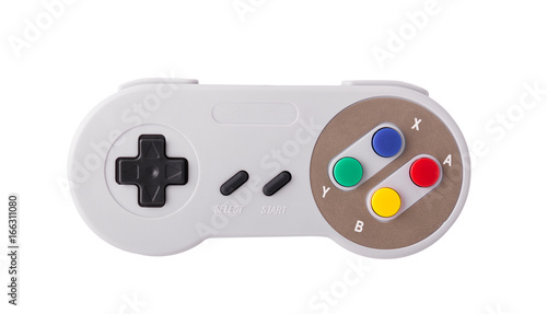 Obraz na płótnie Gray retro joystick on a white background. Video game console GamePad on a white background. Isolated on white w salonie
