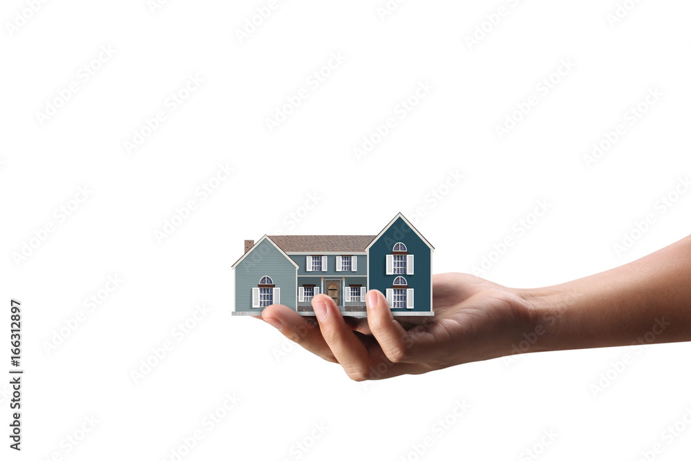 Mortgage concept by house from hand Mortgage concept by house from hand
