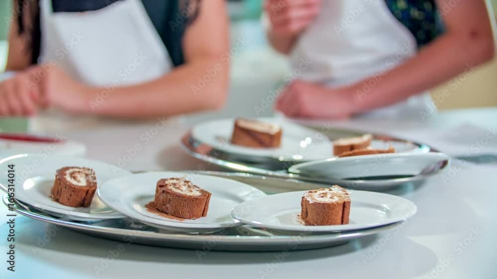 Pupils are enjoying their cooking class. Today, they have baked a chocolate cake with some cream. Pupils are enjoying their cooking class. Today, they have baked a chocolate cake with some cream.