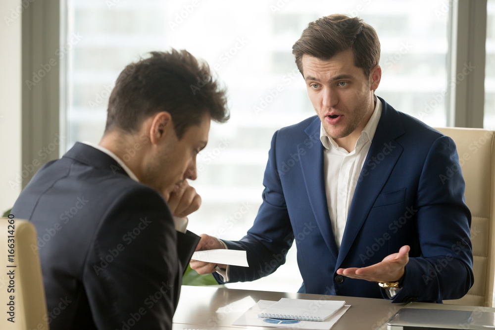Angry mean boss yelling at employee for missing deadline, executive manager scolding ineffective salesman showing bad work results, firing worker for failure, team leader dissatisfied with report Angry mean boss yelling at employee for missing deadline, executive manager scolding ineffective salesman showing bad work results, firing worker for failure, team leader dissatisfied with report