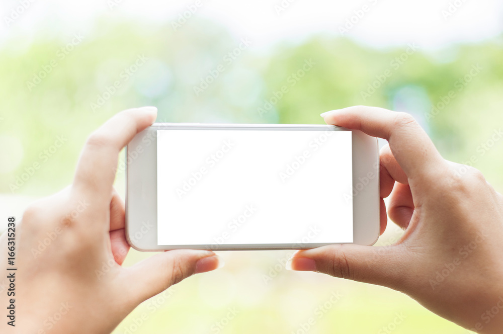 woman using mobile phone with blank screen,business - technology concept