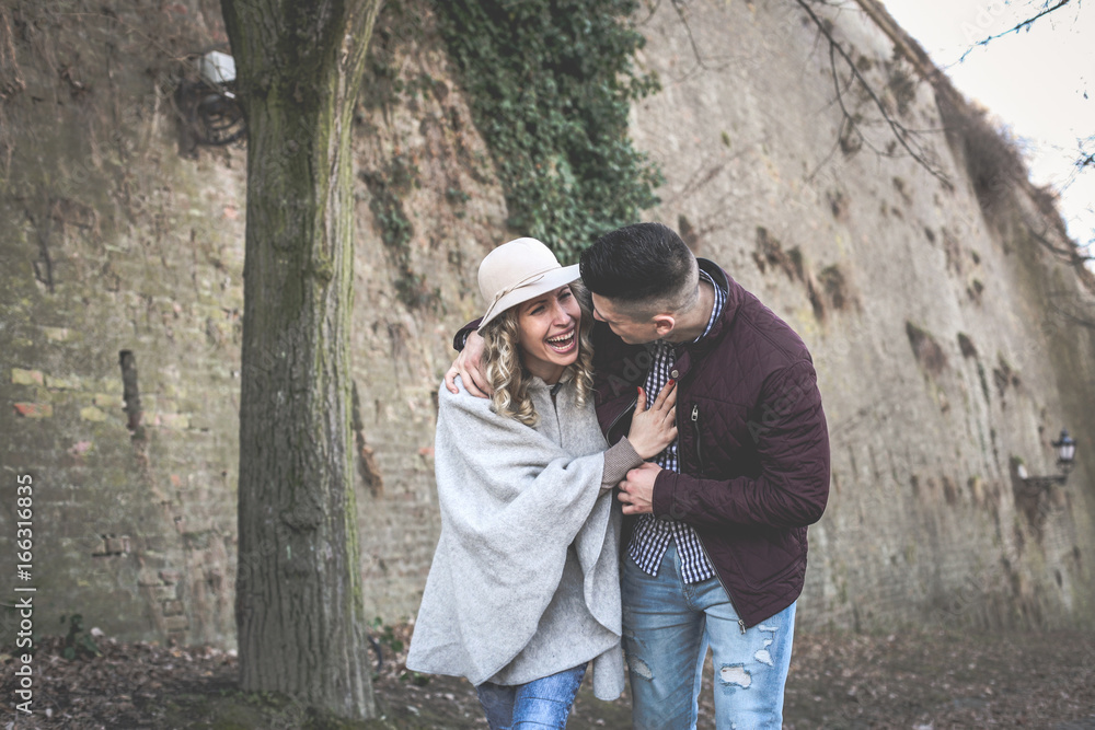Happy couple outdoor. Happy couple enjoying in the park.