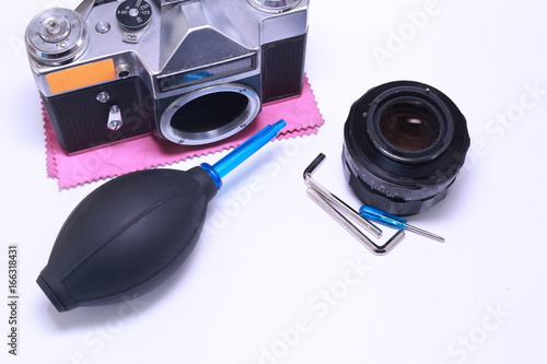 Tools for repairing camera, remove dust. camera cleaning services conceptual image