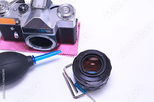 Tools for repairing camera, remove dust. camera cleaning services conceptual image