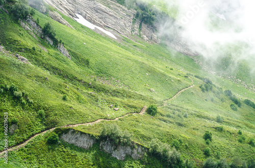 trail on the mountain landscape closeup © senssnow