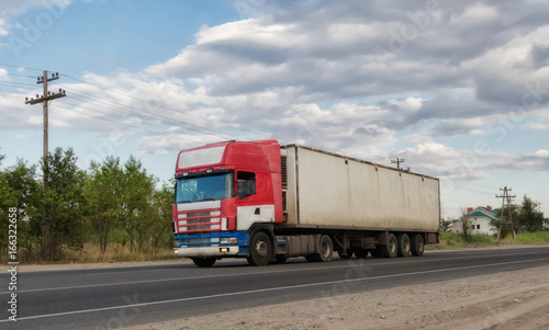 truck tractor with a container for cargo