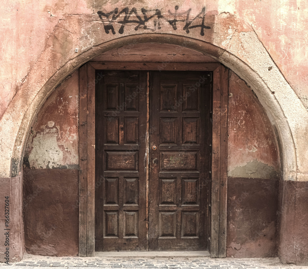 Front view closed door. Old wooden door in Lviv, Ukraine.