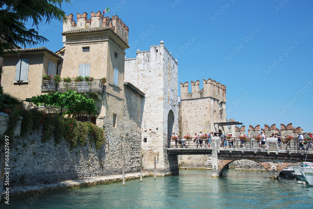 medieval castle Scaliger in old town of Sirmione . beautiful lake Lago di Garda, Italy. June 19, 2017
