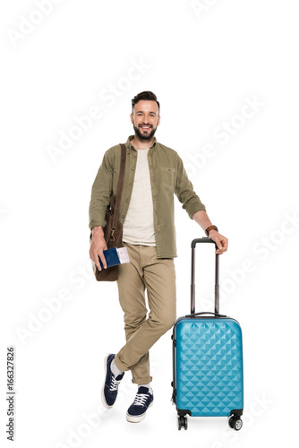 man with passport, tickets and suitcase